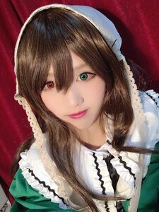 Rating: Safe Score: 0 Tags: 1girl apron bangs brown_hair frills lips long_hair looking_at_viewer maid red_background solo suiseiseki tongue upper_body User: admin