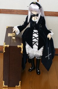 Rating: Safe Score: 0 Tags: 1girl black_dress black_footwear boots cross doll dress frills full_body gothic_lolita hair_over_eyes knee_boots lolita_fashion long_hair long_sleeves solo standing suigintou User: admin