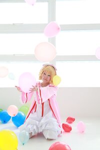 Rating: Safe Score: 0 Tags: 1girl balloon blonde_hair closed_eyes dress food hinaichigo pink_dress ribbon short_hair sitting solo striped striped_background vertical_stripes white_dress User: admin