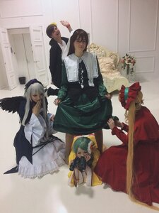Rating: Safe Score: 0 Tags: black_wings blonde_hair brown_hair closed_eyes dress frills long_hair long_sleeves multiple_boys multiple_cosplay multiple_girls shinku suigintou suiseiseki tagme wings User: admin