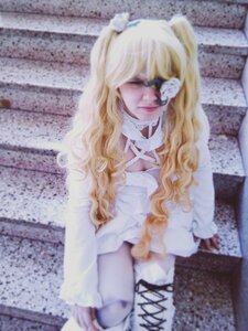 Rating: Safe Score: 0 Tags: 1girl blindfold blonde_hair blurry blurry_background blurry_foreground closed_eyes depth_of_field dress facing_viewer kirakishou long_hair long_sleeves photo solo twintails white_dress User: admin