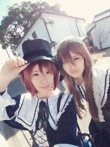 Rating: Safe Score: 0 Tags: 2girls blue_eyes building frills hat long_hair multiple_girls one_eye_closed red_hair siblings sisters smile top_hat twins User: admin