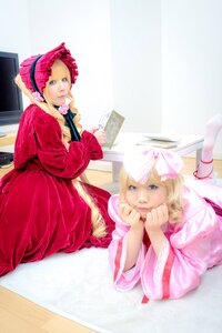 Rating: Safe Score: 0 Tags: 1girl 91076 blonde_hair blue_eyes bonnet dress flower lying multiple_cosplay on_stomach tagme User: admin