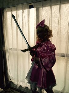 Rating: Safe Score: 0 Tags: 1girl bow curly_hair dress gloves hair_bow indoors red_bow red_dress shinku solo standing weapon User: admin