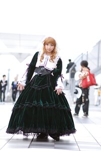 Rating: Safe Score: 0 Tags: blonde_hair blurry blurry_background blurry_foreground depth_of_field dress frills full_body long_sleeves looking_at_viewer motion_blur solo standing suiseiseki User: admin