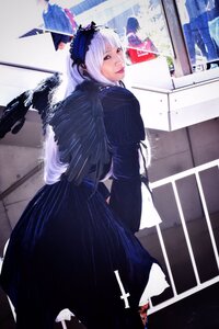 Rating: Safe Score: 0 Tags: 1girl gun lips looking_back solo standing suigintou weapon white_hair User: admin