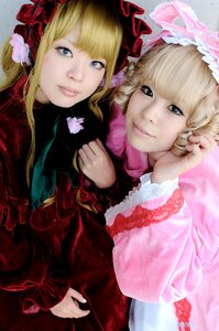 Rating: Safe Score: 0 Tags: 2girls blonde_hair blue_eyes bow dress flower hair_ornament lips looking_at_viewer multiple_cosplay multiple_girls realistic rose shinku smile tagme twins User: admin