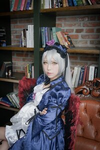 Rating: Safe Score: 0 Tags: 1girl book book_stack bookshelf dress flower green_eyes hair_flower hair_ornament library long_hair looking_at_viewer rose sitting solo suigintou yellow_eyes User: admin