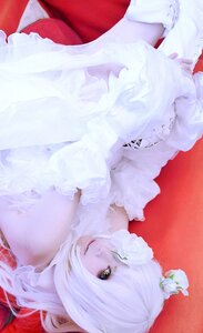 Rating: Safe Score: 0 Tags: 1girl bare_shoulders dress flower hair_flower hair_ornament kirakishou lips long_hair red_background solo white_flower white_hair User: admin