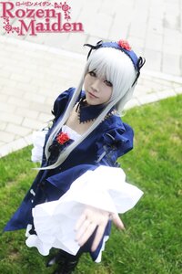 Rating: Safe Score: 0 Tags: 1girl 3d blurry depth_of_field dress field flower frills grass hairband long_sleeves looking_at_viewer outdoors photo solo suigintou User: admin
