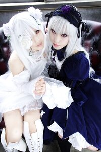 Rating: Safe Score: 0 Tags: 2girls boots dress flower frills gothic_lolita hairband lips lolita_fashion long_hair long_sleeves looking_at_viewer multiple_cosplay multiple_girls rose siblings suigintou tagme white_flower white_hair wings User: admin
