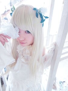 Rating: Safe Score: 0 Tags: 1girl bangs blonde_hair blue_butterfly blue_eyes bug butterfly closed_mouth dress flower hair_ornament hair_over_one_eye insect kirakishou lips long_hair looking_at_viewer smile solo striped vertical_stripes User: admin