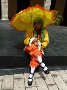 Rating: Safe Score: 0 Tags: 1girl black_umbrella braid closed_eyes dress green_hair holding holding_umbrella kanaria long_hair mary_janes parasol rain red_umbrella shared_umbrella shoes sitting solo umbrella white_legwear User: admin