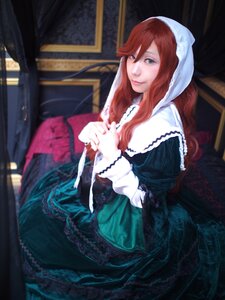 Rating: Safe Score: 0 Tags: 1girl blurry depth_of_field dress frills green_dress green_eyes hands_clasped indoors long_hair long_sleeves looking_at_viewer monster_girl own_hands_together red_hair sitting smile solo suiseiseki User: admin