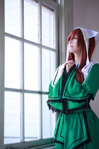Rating: Safe Score: 0 Tags: 1girl blue_eyes dress from_side green_dress indoors long_hair long_sleeves profile solo standing suiseiseki window User: admin