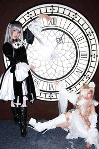 Rating: Safe Score: 0 Tags: 2girls apron bangs boots brown_hair doll_joints dress flower frills joints long_hair long_sleeves multiple_cosplay multiple_girls sitting tagme white_legwear User: admin