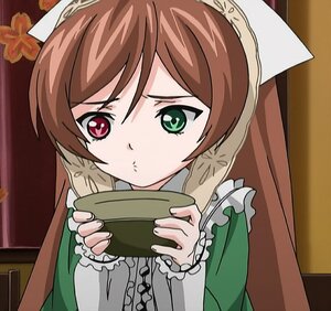 Rating: Safe Score: 0 Tags: 1girl brown_hair dress frills frown green_dress green_eyes holding image red_eyes solo suiseiseki User: admin