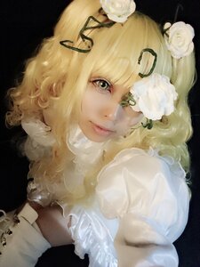 Rating: Safe Score: 0 Tags: 1girl bangs black_background blonde_hair closed_mouth eyelashes flower hair_flower hair_ornament hair_ribbon kirakishou lips looking_at_viewer puffy_sleeves realistic red_lips ribbon rose short_hair solo upper_body white_flower white_rose User: admin