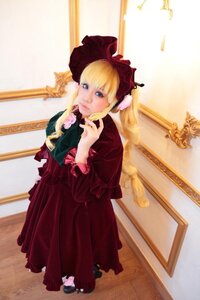 Rating: Safe Score: 0 Tags: 1girl blonde_hair blue_eyes bonnet bow dress full_body indoors long_hair long_sleeves red_dress rose shinku shoes solo standing User: admin