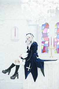 Rating: Safe Score: 0 Tags: 1girl black_legwear boots dress frills high_heels long_sleeves sitting solo suigintou User: admin