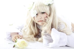 Rating: Safe Score: 0 Tags: 1girl bangs blonde_hair flower food fruit hair_flower hair_ornament kirakishou lips long_hair realistic solo striped striped_shirt vertical_stripes yellow_eyes User: admin