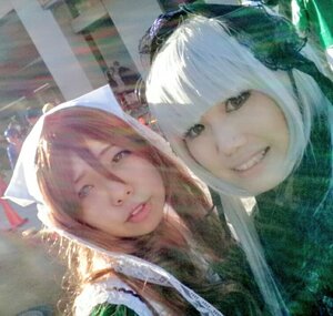 Rating: Safe Score: 0 Tags: 2girls black_eyes hat head_scarf lips looking_at_viewer multiple_cosplay multiple_girls smile tagme User: admin