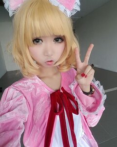 Rating: Safe Score: 0 Tags: 1girl bangs blonde_hair dress fingernails hinaichigo lips long_sleeves looking_at_viewer nail_polish neck_ribbon pink_dress realistic ribbon short_hair solo upper_body v User: admin