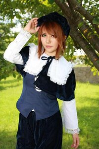 Rating: Safe Score: 0 Tags: 1girl bangs brown_hair capelet day grass hat long_sleeves looking_at_viewer outdoors short_hair solo souseiseki sunlight tree User: admin