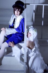Rating: Safe Score: 0 Tags: 1girl black_hair blue_dress dress frills hat multiple_cosplay pantyhose sitting tagme white_legwear User: admin