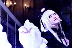Rating: Safe Score: 0 Tags: 1girl bangs blunt_bangs blurry blurry_background depth_of_field dress flower long_hair red_eyes solo suigintou white_hair User: admin