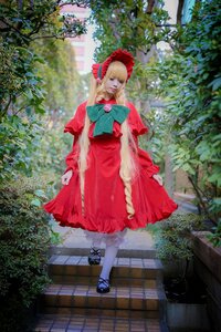 Rating: Safe Score: 0 Tags: 1girl blonde_hair bonnet bow bush dress frills long_sleeves outdoors pantyhose plant red_dress shinku shoes solo standing tree white_legwear User: admin