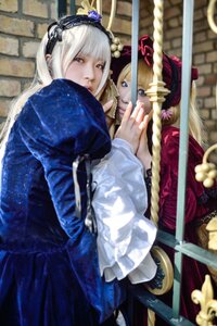 Rating: Safe Score: 0 Tags: 2girls bangs blonde_hair blue_eyes blurry depth_of_field dress frills hairband hug indoors lolita_fashion long_hair long_sleeves looking_at_viewer multiple_cosplay multiple_girls red_eyes shinku sitting tagme white_hair User: admin