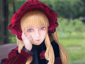 Rating: Safe Score: 0 Tags: 1girl bangs blonde_hair blue_eyes blunt_bangs blurry blurry_background bonnet closed_mouth depth_of_field lips long_hair long_sleeves looking_at_viewer outdoors shinku smile solo upper_body User: admin