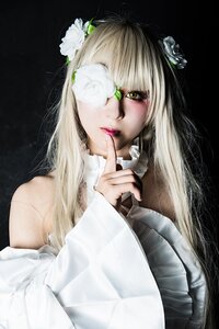 Rating: Safe Score: 0 Tags: 1girl bangs bare_shoulders black_background blonde_hair eyepatch finger_to_mouth fingernails flower hair_flower hair_ornament index_finger_raised kirakishou lips long_hair nail_polish solo upper_body white_flower User: admin