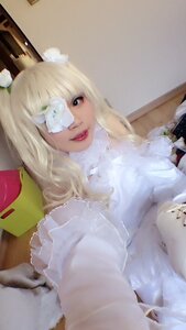 Rating: Safe Score: 0 Tags: 1girl animal_ears blonde_hair flower hair_ornament kirakishou lips looking_at_viewer reaching_out realistic smile solo upper_body User: admin