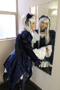 Rating: Safe Score: 0 Tags: 2girls blonde_hair dress frills indoors long_hair long_sleeves multiple_girls photo ribbon siblings silver_hair sisters sitting solo standing suigintou twins window wings User: admin