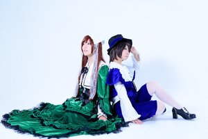 Rating: Safe Score: 0 Tags: 2girls back-to-back black_hair blue_eyes brown_hair dress frills green_dress hat long_hair long_sleeves multiple_cosplay multiple_girls pantyhose short_hair sitting striped striped_legwear tagme vertical-striped_legwear User: admin