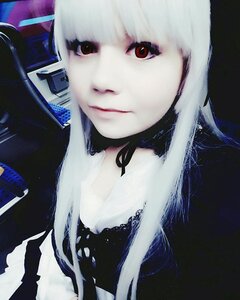 Rating: Safe Score: 0 Tags: 1girl bangs black_background choker closed_mouth lips looking_at_viewer pale_skin red_eyes solo suigintou upper_body white_hair User: admin