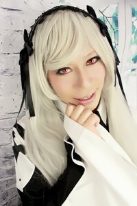 Rating: Safe Score: 0 Tags: 1girl blonde_hair face hairband lips lolita_fashion long_hair looking_at_viewer red_eyes ribbon sleeves_past_wrists smile solo suigintou User: admin
