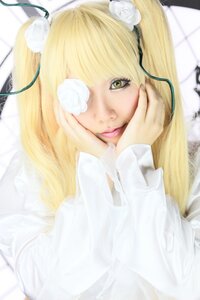 Rating: Safe Score: 0 Tags: 1girl bangs blonde_hair blurry blurry_background blurry_foreground chin_rest depth_of_field eyepatch feathers flower green_eyes hair_ornament kirakishou lips long_hair looking_at_viewer photo ribbon solo white_flower white_rose User: admin