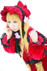 Rating: Safe Score: 0 Tags: 1girl bangs blonde_hair blue_eyes bonnet bow dress eyelashes flower frills lace lips long_hair long_sleeves red_dress shinku solo striped upper_body User: admin