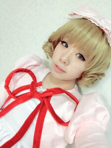 Rating: Safe Score: 0 Tags: 1girl bangs blonde_hair closed_mouth dress hinaichigo lips looking_at_viewer red_ribbon ribbon short_hair smile solo striped upper_body User: admin