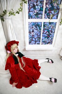 Rating: Safe Score: 0 Tags: 1girl blonde_hair bonnet bow dress flower long_hair long_sleeves red_dress shinku sitting solo white_legwear window User: admin