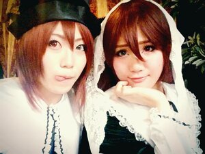 Rating: Safe Score: 0 Tags: 2girls 91076 brown_hair hair_between_eyes hat head_scarf lips looking_at_viewer multiple_cosplay multiple_girls red_lipstick siblings sisters smile souseiseki suiseiseki tagme twins User: admin