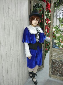 Rating: Safe Score: 0 Tags: 1girl bangs black_footwear brown_hair capelet flower hat long_sleeves looking_at_viewer plant rose shoes short_hair solo souseiseki standing window User: admin