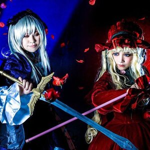 Rating: Safe Score: 0 Tags: 2girls blonde_hair blue_eyes dress flower lipstick long_hair makeup multiple_cosplay multiple_girls rose shinku staff tagme weapon User: admin