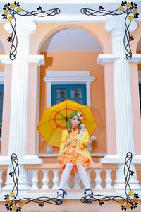Rating: Safe Score: 0 Tags: 1girl dress flower frills holding_umbrella kanaria parasol sitting solo umbrella white_legwear User: admin