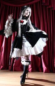 Rating: Safe Score: 0 Tags: 1girl boots curtains dress flower fur_trim gothic_lolita lolita_fashion long_hair pale_skin rose solo suigintou white_hair User: admin