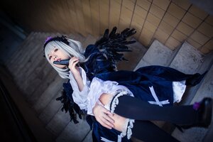 Rating: Safe Score: 0 Tags: 1girl black_legwear dress frills gothic_lolita hairband indoors lolita_fashion long_hair long_sleeves silver_hair solo suigintou thighhighs wings User: admin