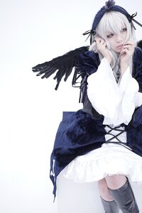 Rating: Safe Score: 0 Tags: 1girl bangs black_wings boots dress frills hairband long_hair long_sleeves looking_at_viewer ribbon silver_hair solo suigintou wings User: admin